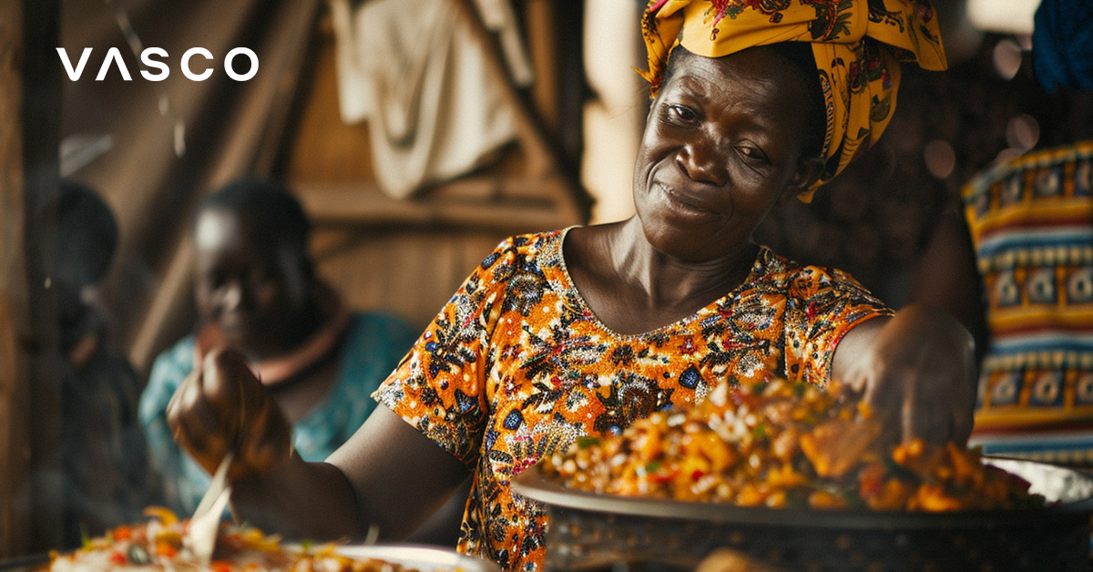 Une femme africaine qui prépare à manger.